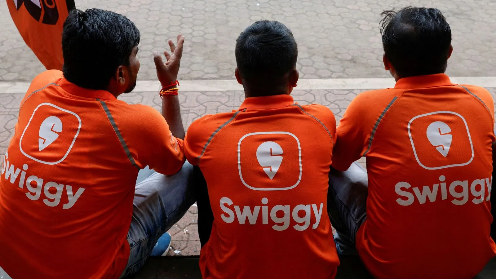 FILE PHOTO Swiggy Gig Workers Talk To Each Other 1739441594178 1746697013989