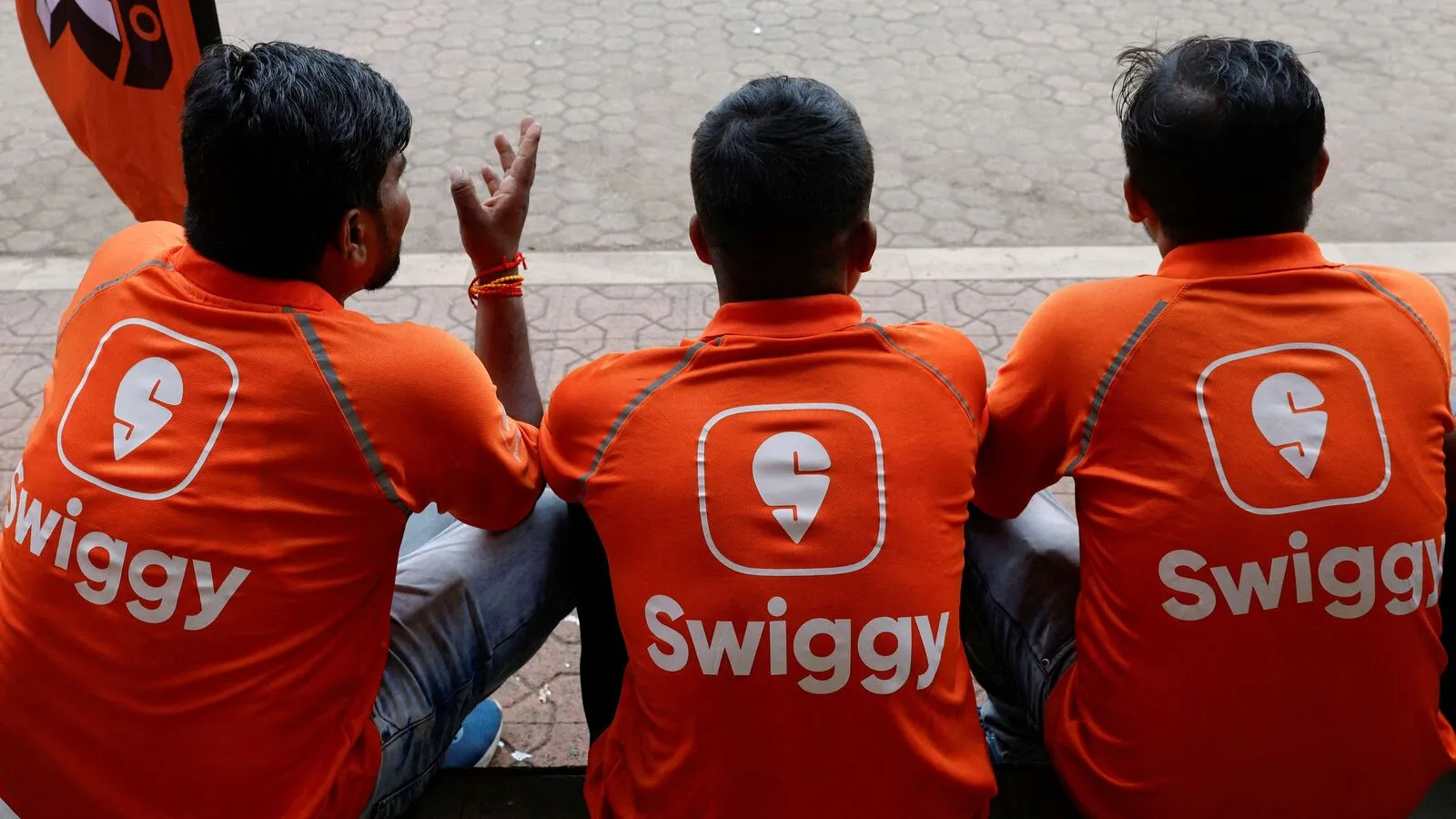 FILE PHOTO Swiggy Gig Workers Talk To Each Other 1739441594178 1746758363101